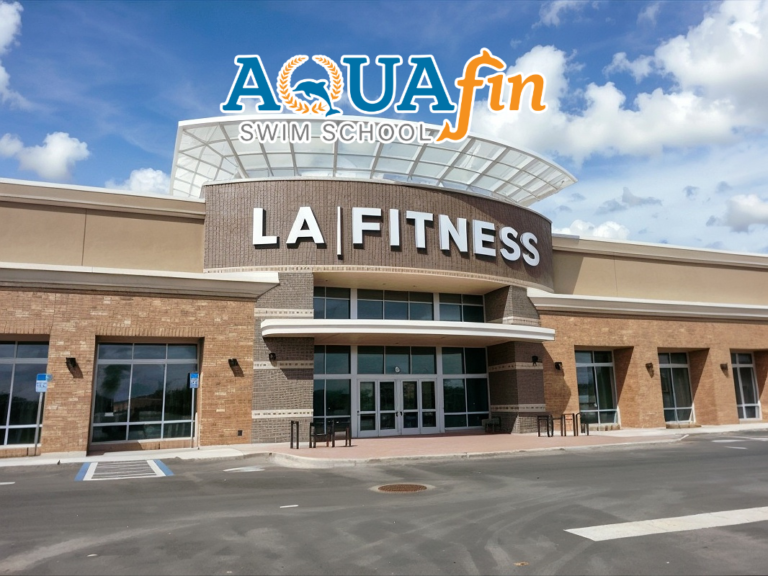 A large building with the name of la fitness on it.